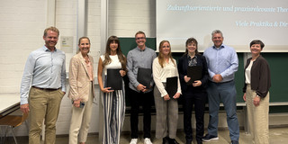 PwC award winners with representatives from PwC and TU Dortmund University